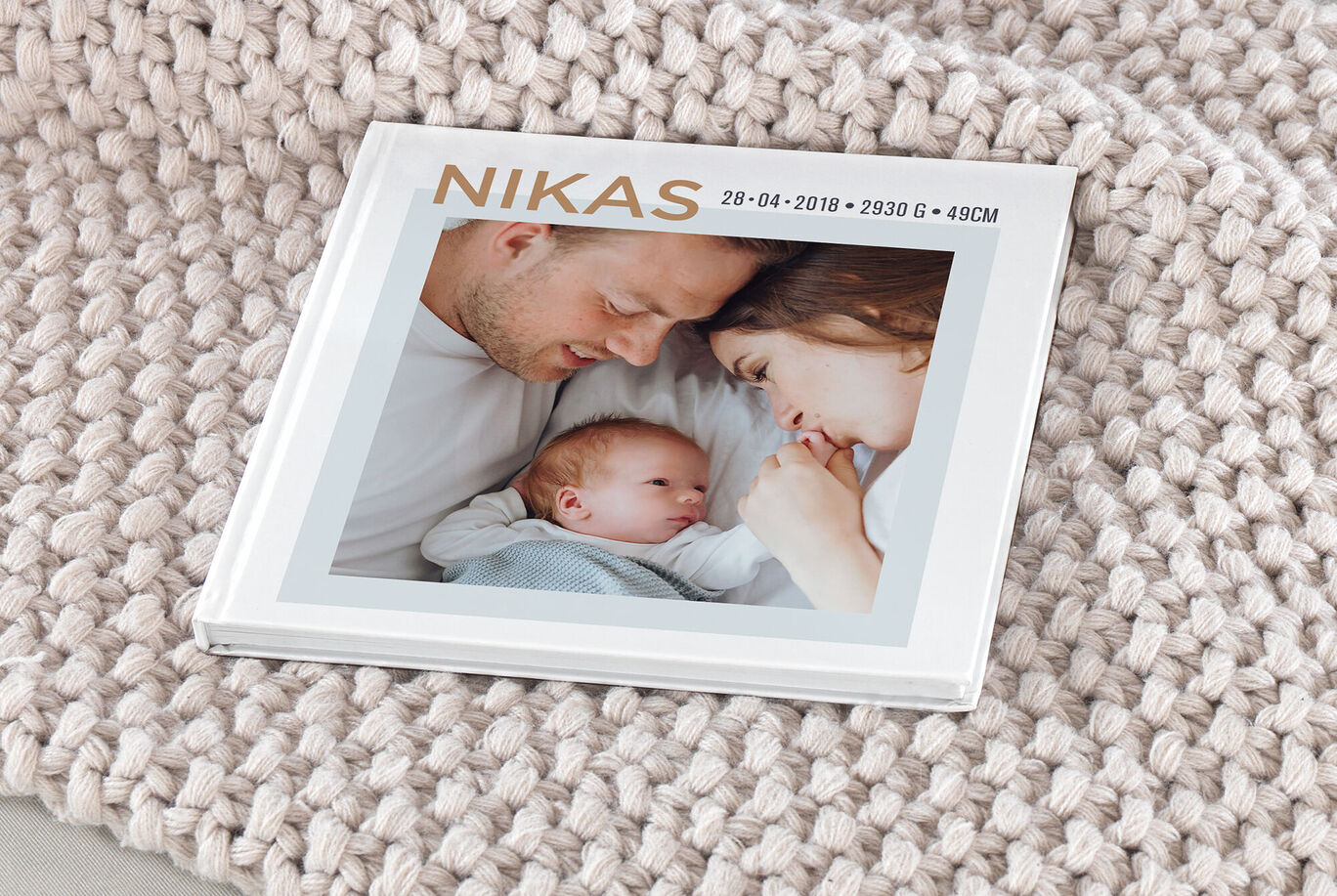 Un bellissimo CEWE Fotolibro mostra un amorevole momento genitore-figlio